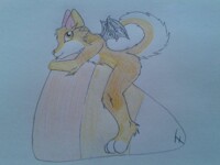 Candy Corn Husky on his Candycorn :3