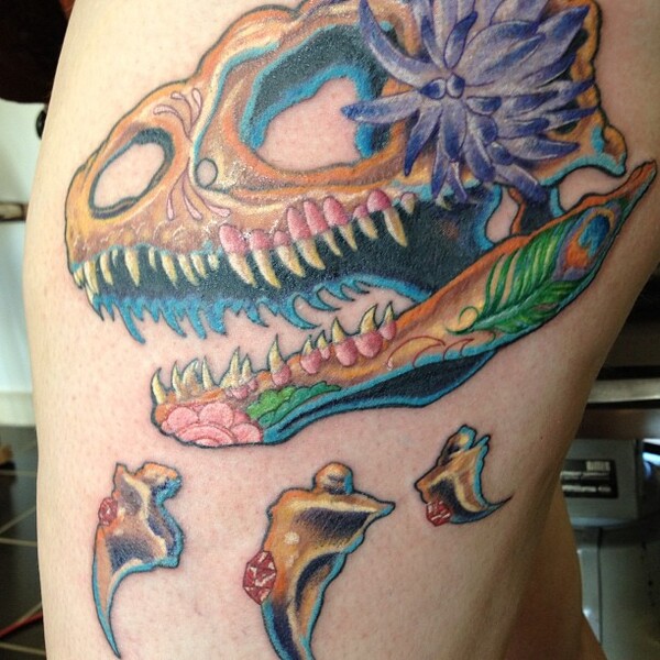 Dinosaur skull and flowers tattoo idea black ink dot and line work  Tattoos  Dinosaur tattoos Body art tattoos