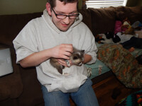 Yep, holding a baby foxy!! 