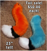 2 large fox tails