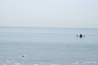 A Solitary Man In His Canoe