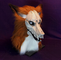 Zombie skull fox fursuit head, mouth open.