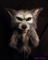 Scary grey werewolf fursuit head.