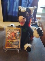 Cave Plushie and a Logan Paul Prime Lemonade Pokemon Card