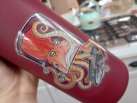 octopus in a jar on a water bottle