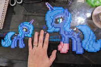 Luna for scale (mini perler beads!)